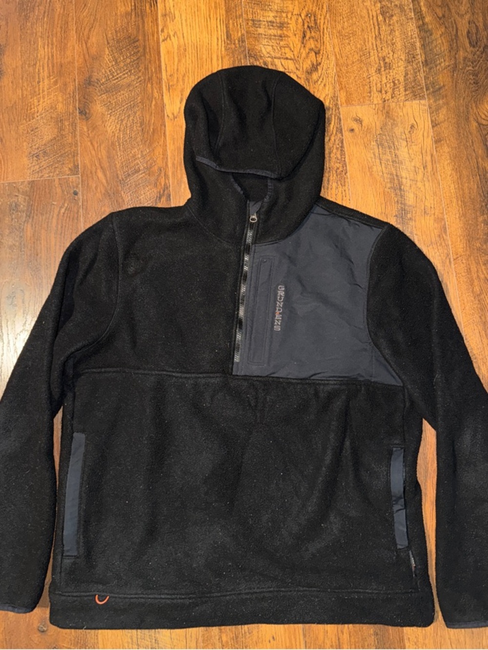 Grunden’s Black Hooded Fleece Pullover with Chest Zip